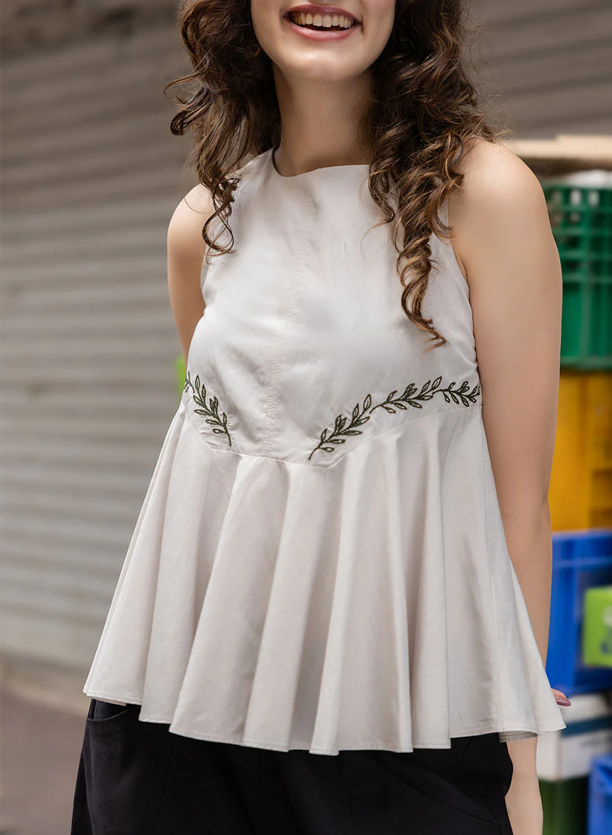Half Peplumed Sleeveless Embroidered Top
